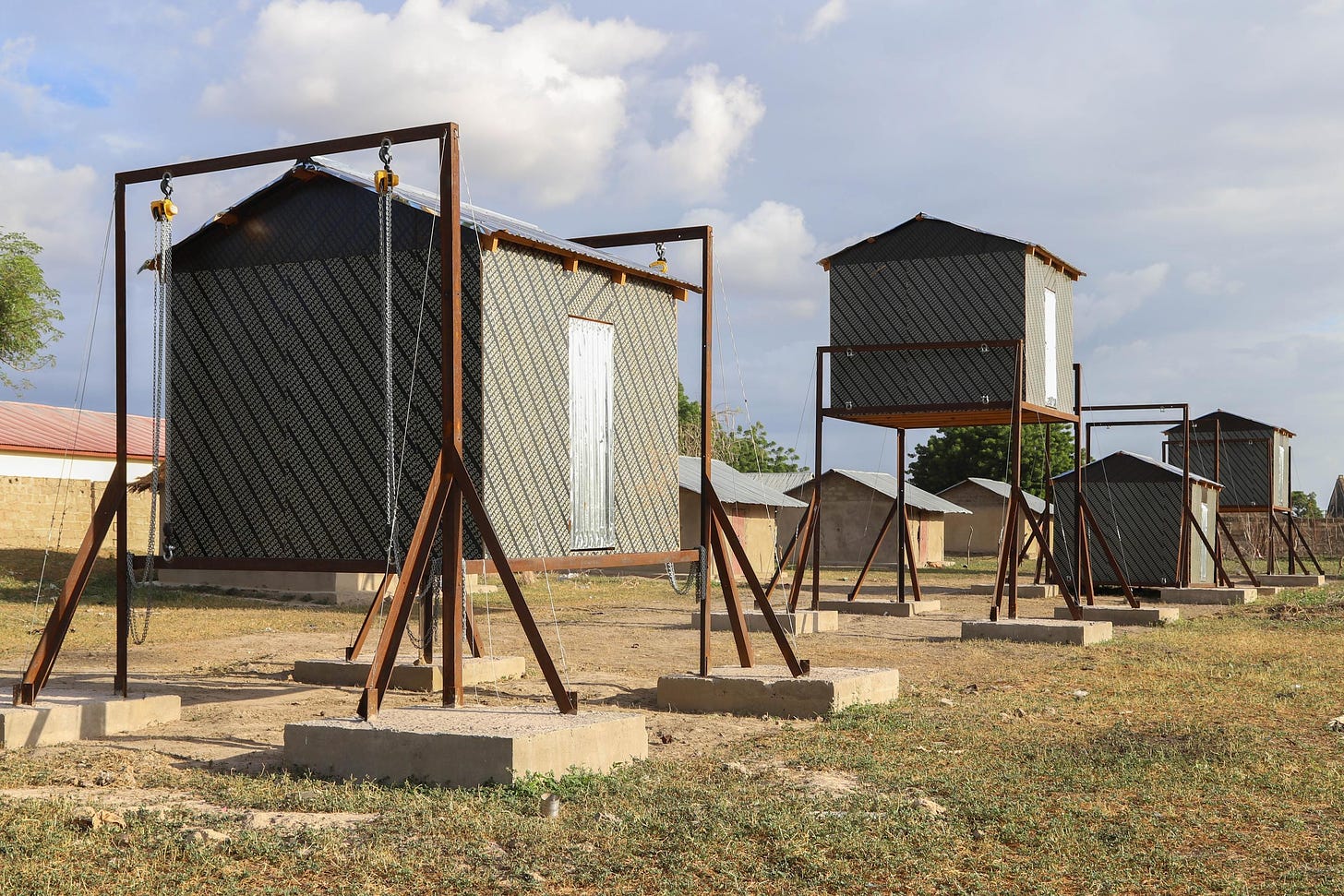 The four adjustable-height huts utilized in the study