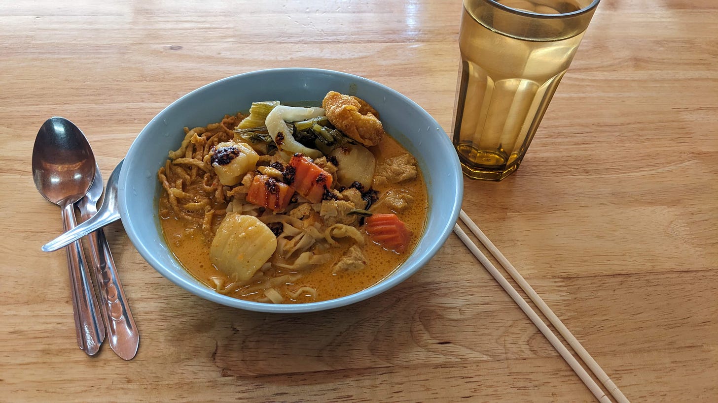 bowl of khao soi curry noodles