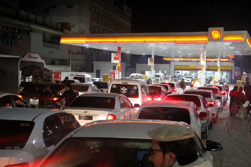 Long queues at a petrol station in Peshawar (Hussain Ali via Getty Images)