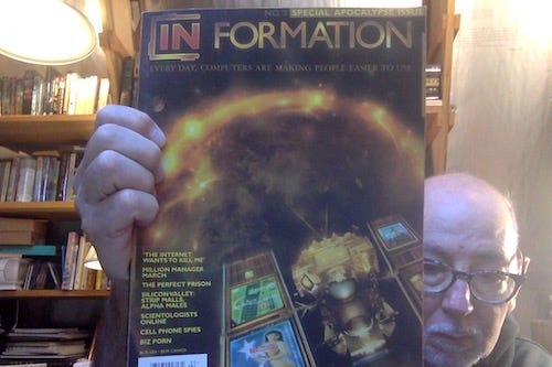 Photo of an old, bald, befuddled-looking guy (me) holds a copy of the Special Apocalypse Issue of In Formation magazine. Featured articles mention on the cover include "The Internet Wants to Kill me".