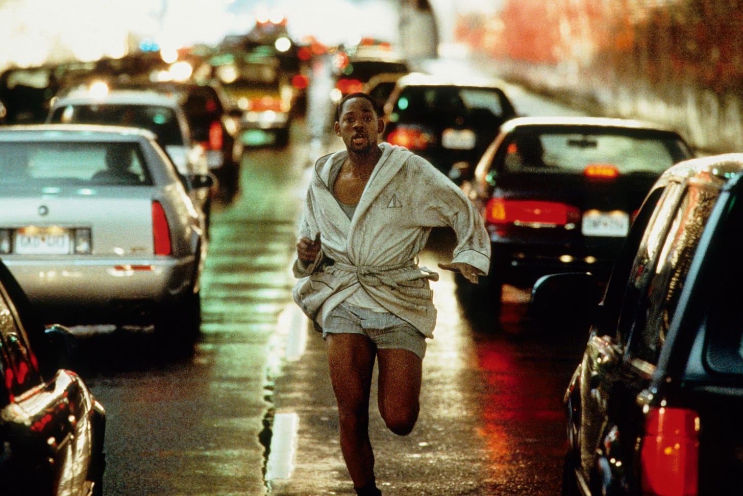 Will Smith running down the highway in his bathrobe in "Enemy of the State" (1998)