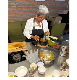 A person cooking in a kitchen
Description automatically generated A person cooking in a kitchen
Description automatically generated
