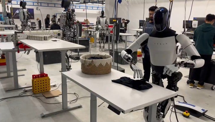 Tesla Optimus robot folding laundry