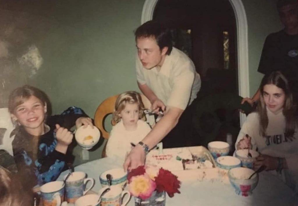 Elon Musk with, from left, half-sisters Alexandra and Asha Rose Musk, and stepsister Jana Bezuidenhout. Photo: Alexandra Musk-Steuart/Facebook