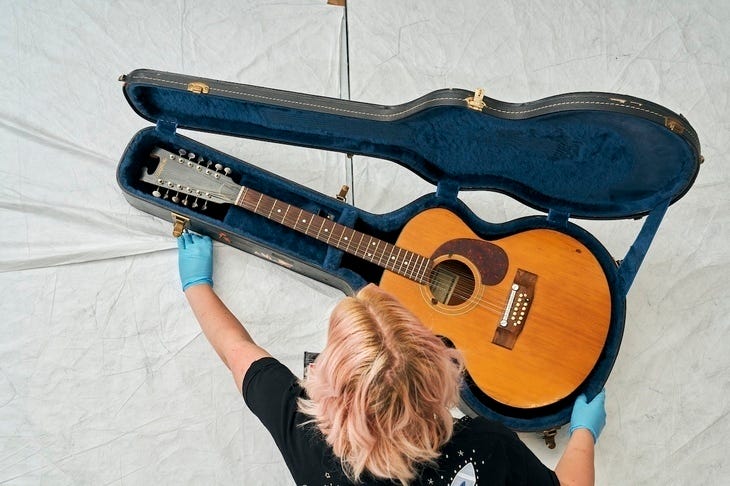 Ziggy played guitar... then carefully placed it in museum wrap using protective gloves