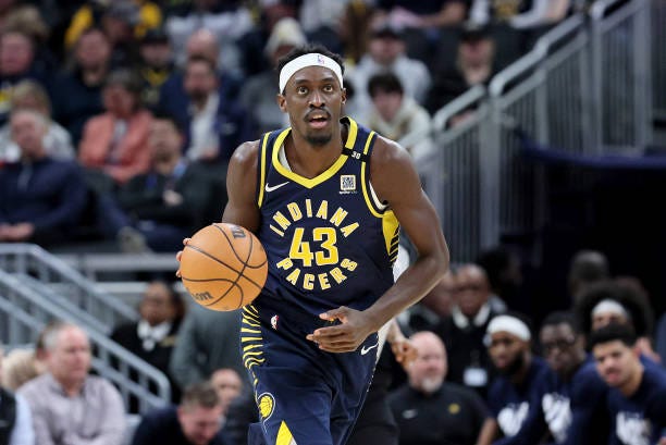 Pascal Siakam of the Indiana Pacers dribbles the ball in the first half against the Houston Rockets at Gainbridge Fieldhouse on February 06, 2024 in...