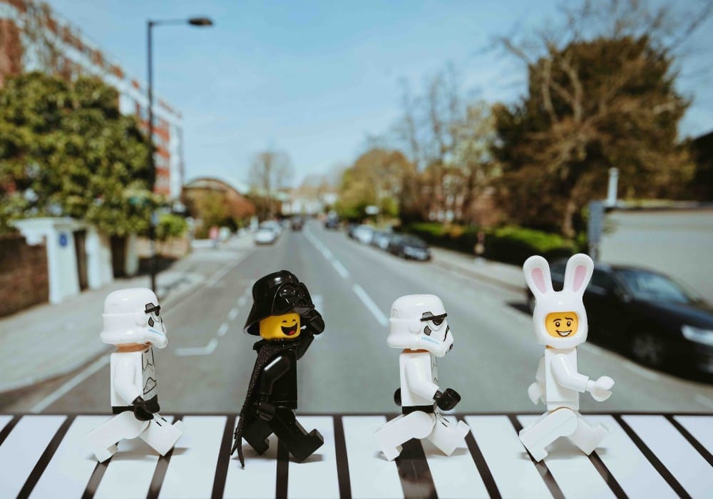 Lego figurines acting out the Beatles' Abbey Road album cover
