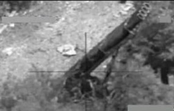 Very grainy image of a Katyusha rocket launcher set up in southern Lebanon