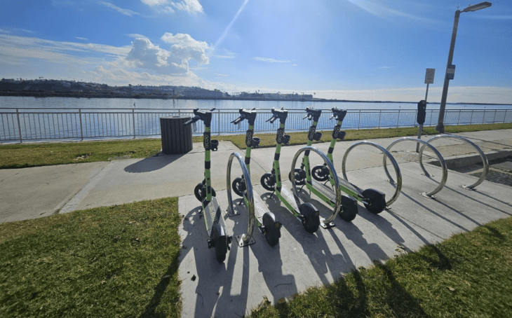 row of shared e-scooters