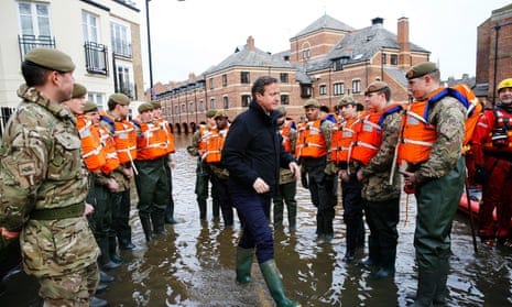 David Cameron and flood relief workers