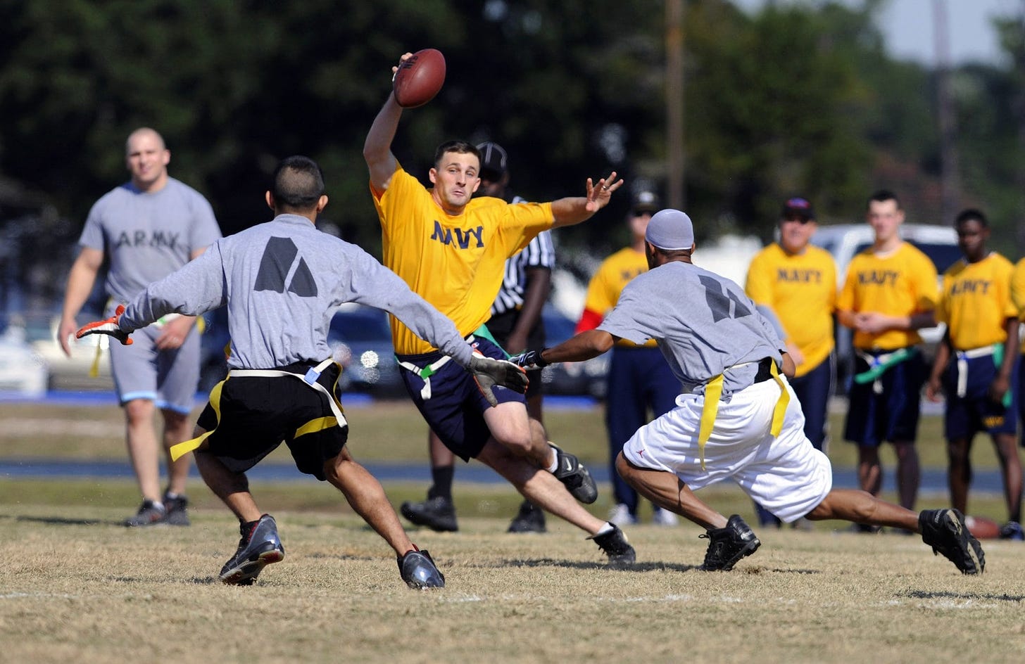 flag football born in the us military with players in a game
