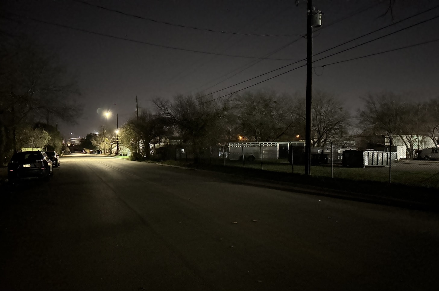 Noir postindustrial streetscape at the edge of town