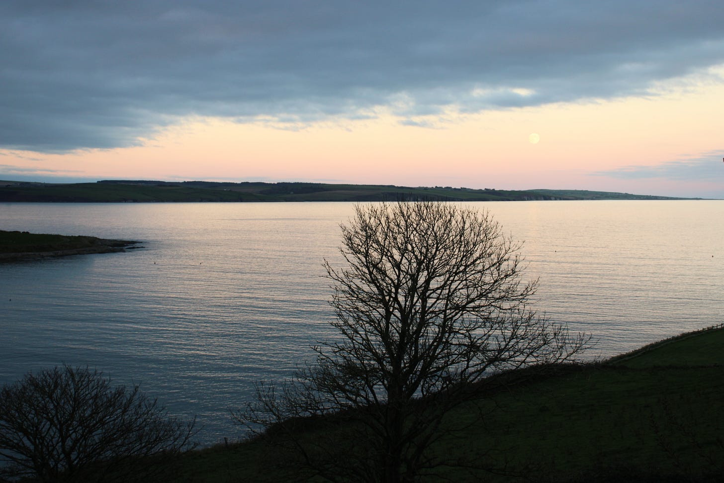 View over the Atlantic during dusk at Full Moon. West Cork, Ireland. Photo by Jody Day