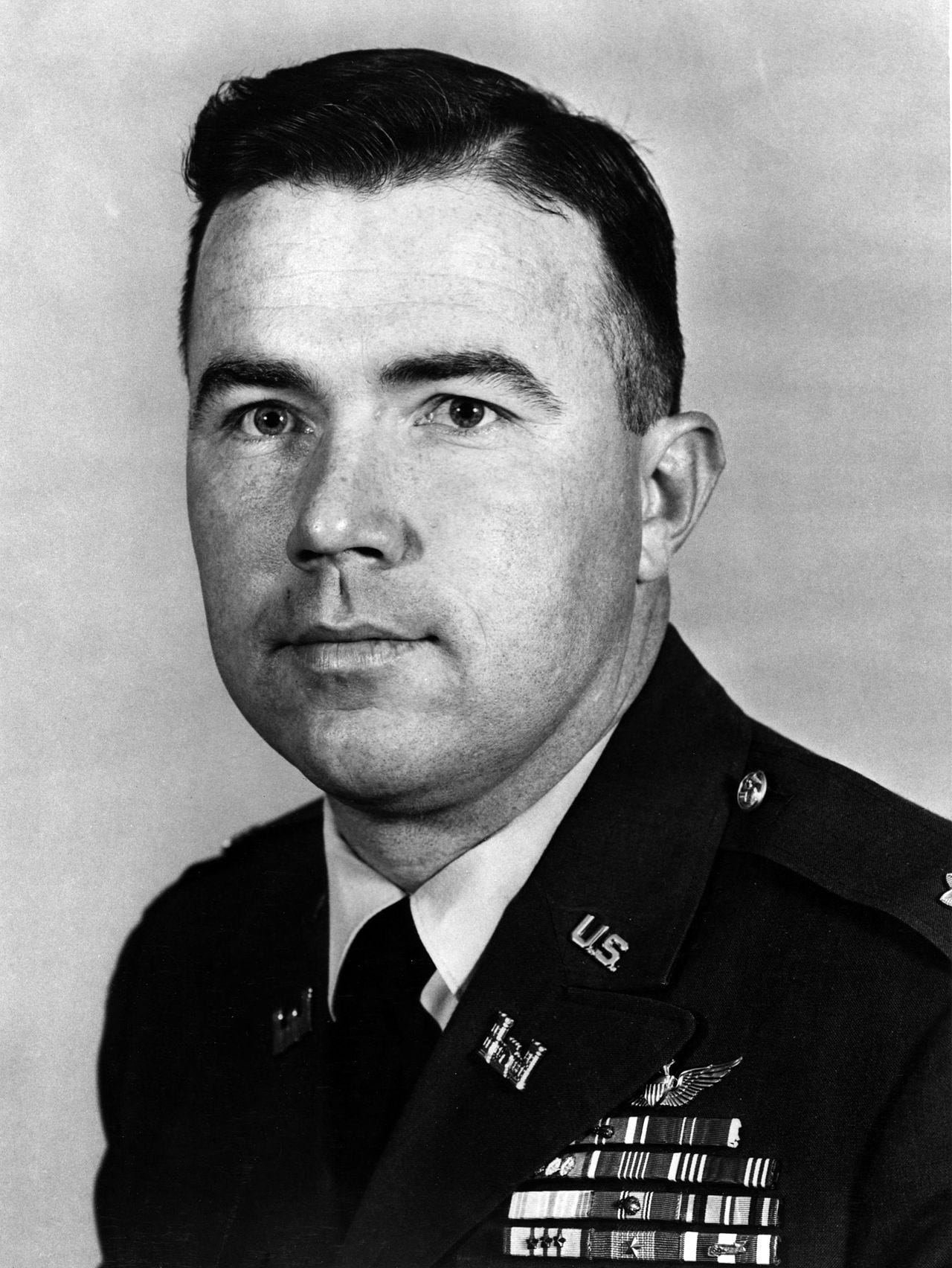 Headshot of a young Crandall, in uniform.