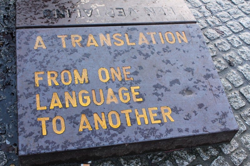 An engraving that reads: “A Translation — From One Language to Another
