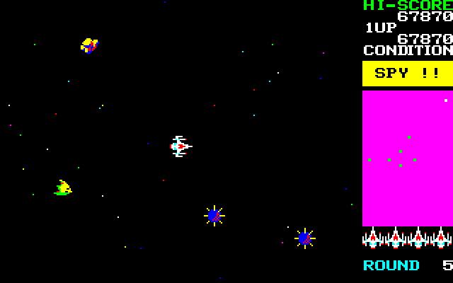 A screenshot of a port of Bosconian on the Sharp X68000 personal computer, featuring the ship in the middle of the screen, mines, a yellow-green spy ship trying to escape, the game's radar that shows the location of space stations, and a condition Yellow warning.