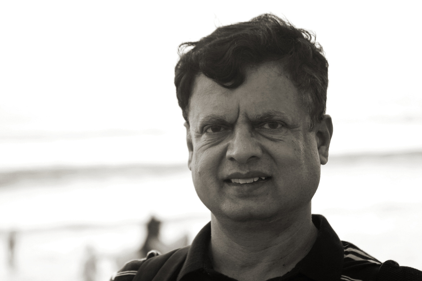 May be a black-and-white image of 1 person and smiling