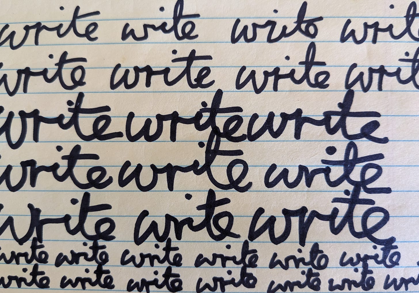 Lined legal paper with boldface cursive words repeating across it: write write write ...