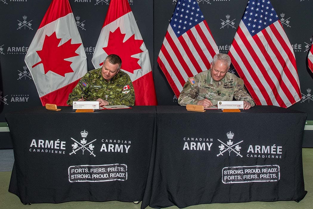 Major-General Conrad Mialkowski, Deputy Commander of the Canadian Army, and Lieutenant General John R. Evans, Jr. Commander of the United States Army North (Fifth Army) and Senior Commander, Fort Sam Houston and Camp Bullis, sign the Bilateral Army Training Strategy during a visit to the Canadian Army Headquarters in Ottawa, Ontario on March 8, 2022. Photo: Sailor First Class Camden Scott, Directorate Army Public Affairs. Major-General Conrad Mialkowski, Deputy Commander of the Canadian Army, and Lieutenant General John R. Evans, Jr. Commander of the United States Army North (Fifth Army) and Senior Commander, Fort Sam Houston and Camp Bullis, sign the Bilateral Army Training Strategy during a visit to the Canadian Army Headquarters in Ottawa, Ontario on March 8, 2022. Photo: Sailor First Class Camden Scott, Directorate Army Public Affairs.