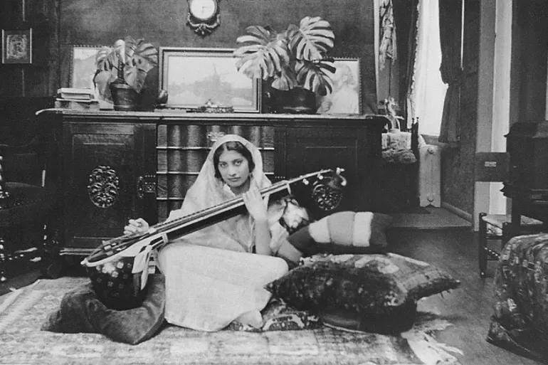 r/HistoryPorn - Noor Inayat Khan with a traditional vina, 1930s. Born as an Indian princess to Muslim parents, Khan served as a secret agent for the British SOE during WW2, the first woman to covertly enter France as a radio operator. She was captured by Gestapo & executed at Dachau. [770x513]