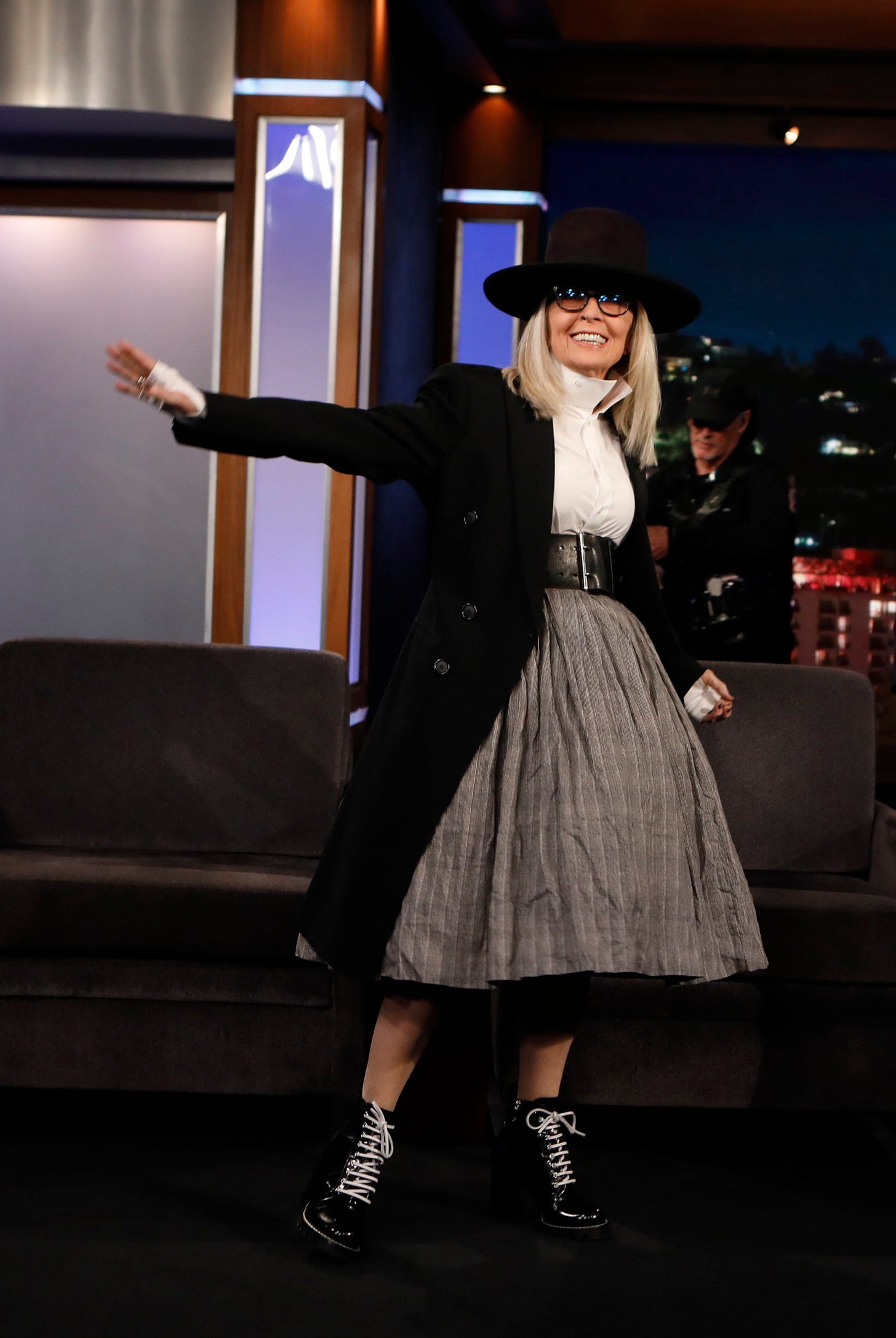 Image may contain Clothing Apparel Coat Human Person Hat Diane Keaton Overcoat Long Sleeve and Sleeve