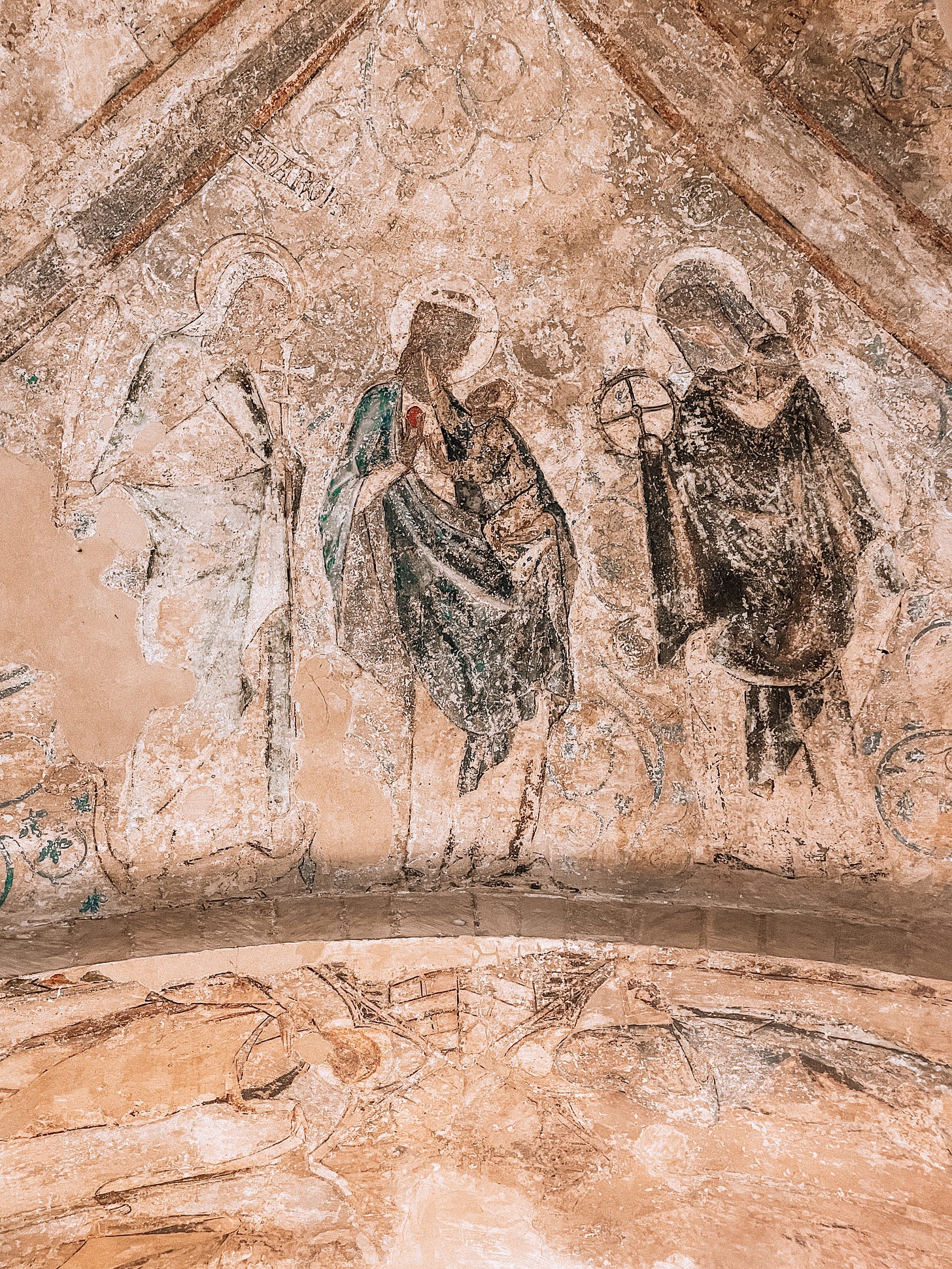 A fresco panel in Norwich Cathedral treasury featuring Mary, St Margaret of Antioch and St Catherine