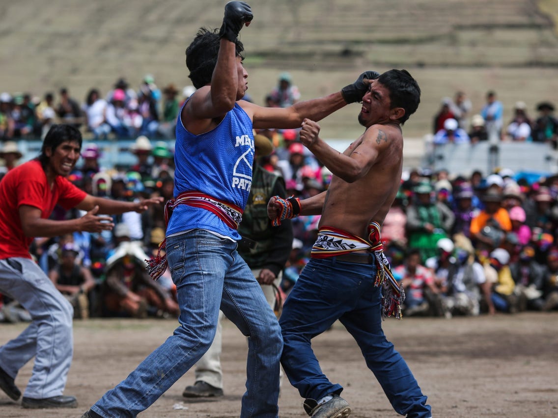 PHOTOS: in Parts of Peru, Locals Settle Scores With Christmas Day  Fist-Fights - Business Insider