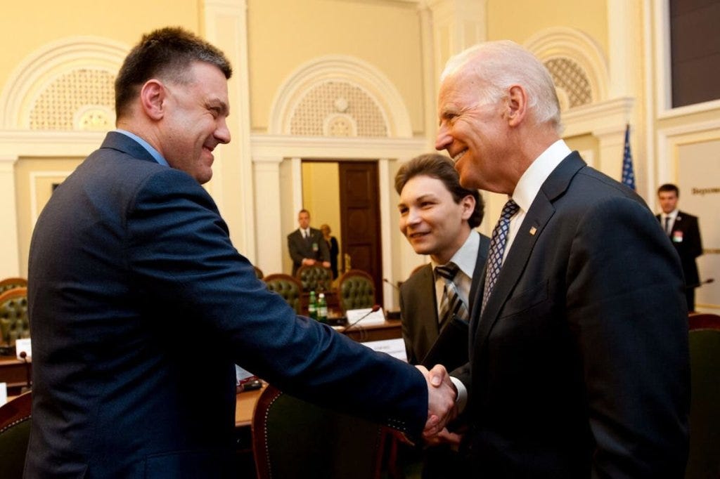 Here's your President shaking hands with an actual neo-nazi leader. Ukraine: Could this be what America, especially the Left is hiding?.. And why they want Assange gone so bad?? Both sides are equally in on it btw.