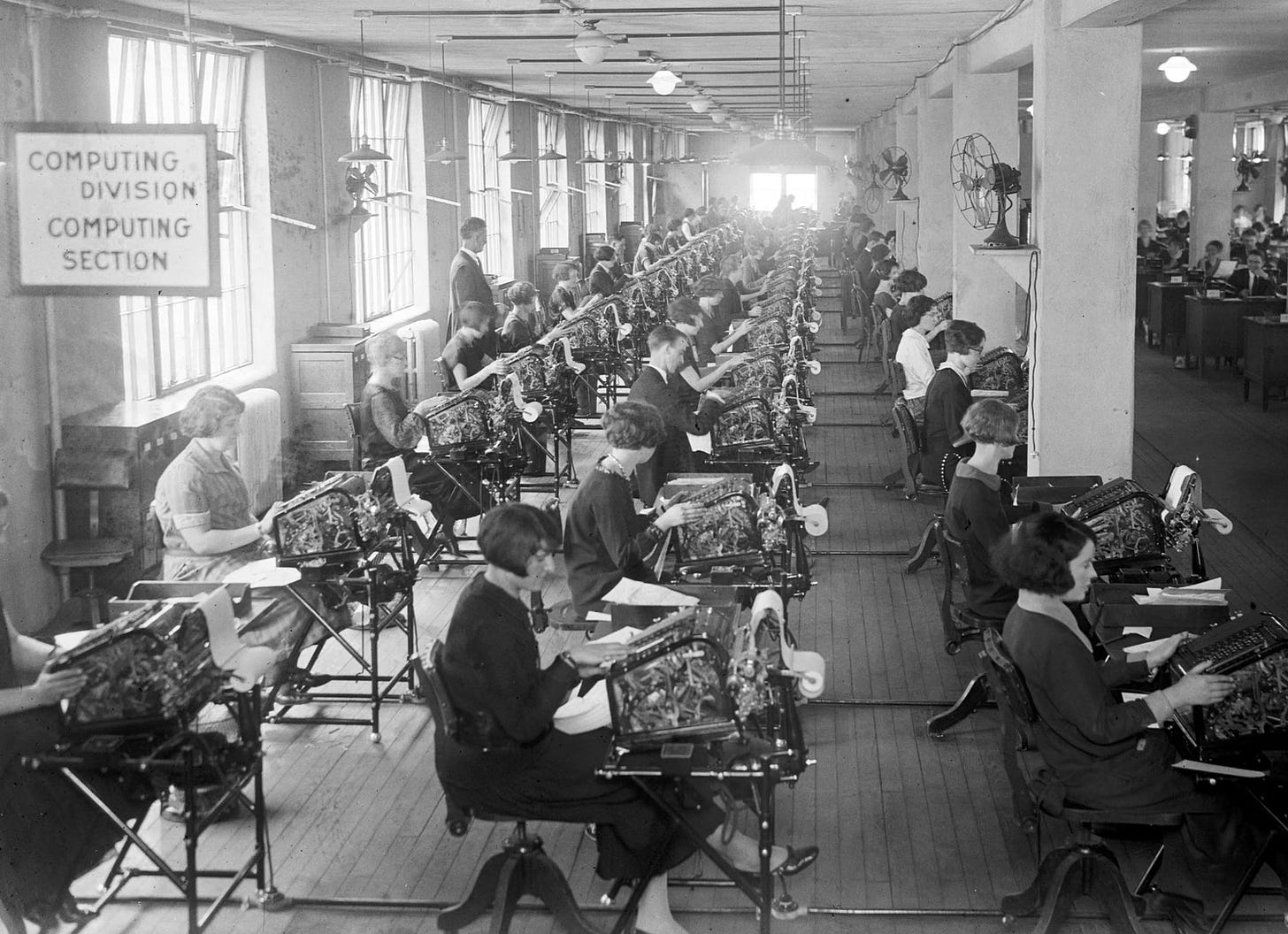 U.S. government clerks use new calculating machines to determine the bonuses for World War I veterans, following the passage of the 1924 World War Adjusted Compensation Act, or "Bonus Act," compensating veterans for wages lost during their service.