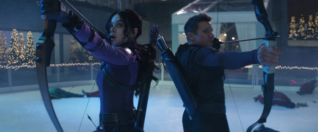 (L-R): Kate Bishop (Hailee Steinfeld) and Hawkeye/Clint Barton (Jeremy Renner) in Marvel Studios' HAWKEYE, exclusively on Disney+. Photo by Chuck Zlotnick. ©Marvel Studios 2021. All Rights Reserved.