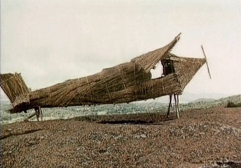 A straw and coconut airplane - used to attract cargo