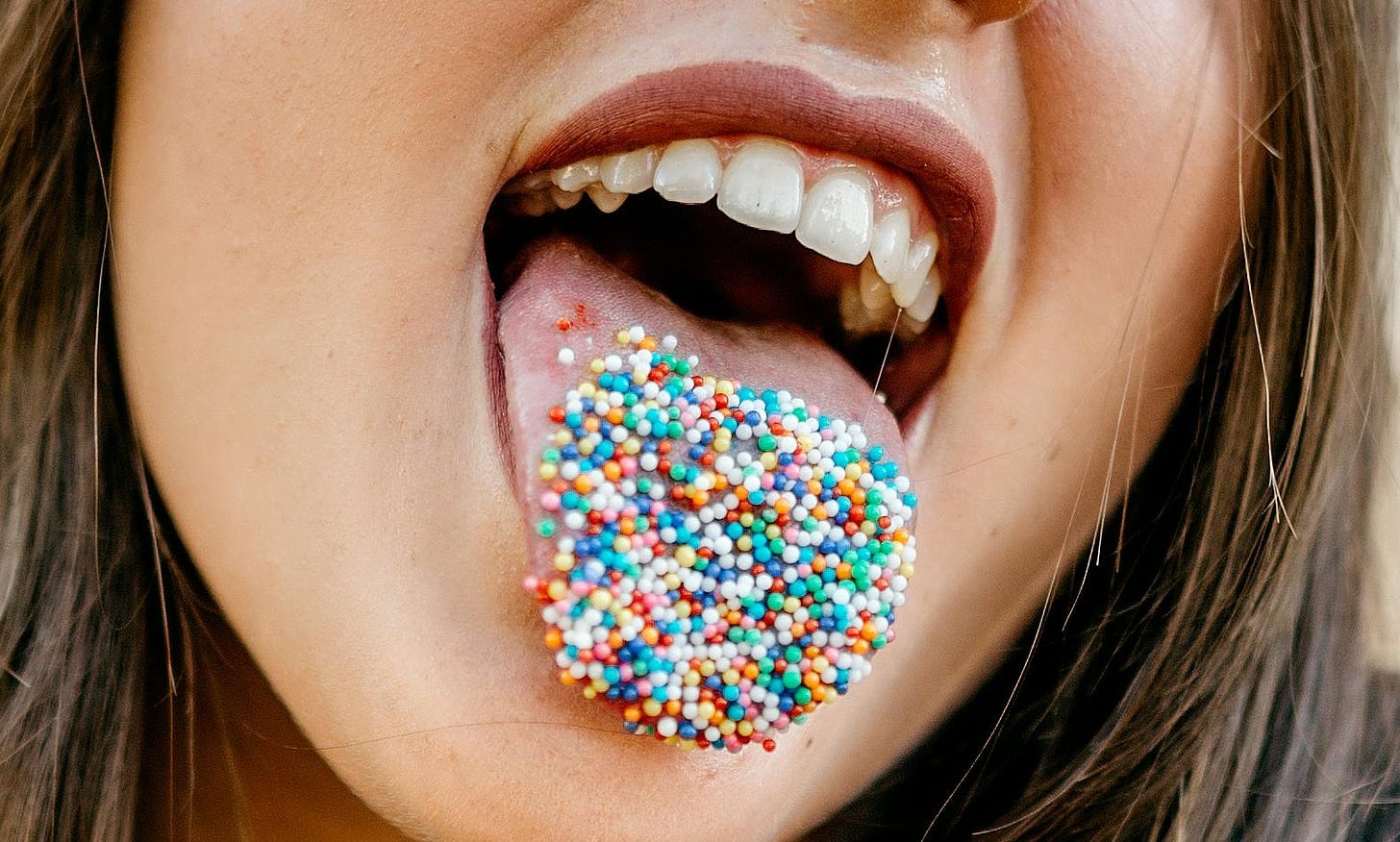 Tongue covered in sprinkles