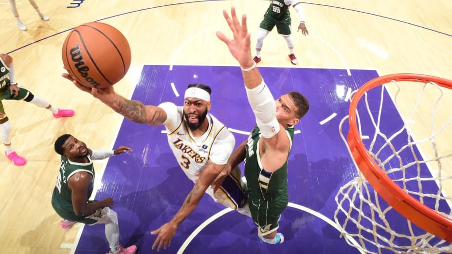 Anthony Davis, #3 of the Los Angeles Lakers, drives to the basket during the game against the Milwaukee Bucks at Crypto.com Arena in Los Angeles on Oct. 15, 2023.