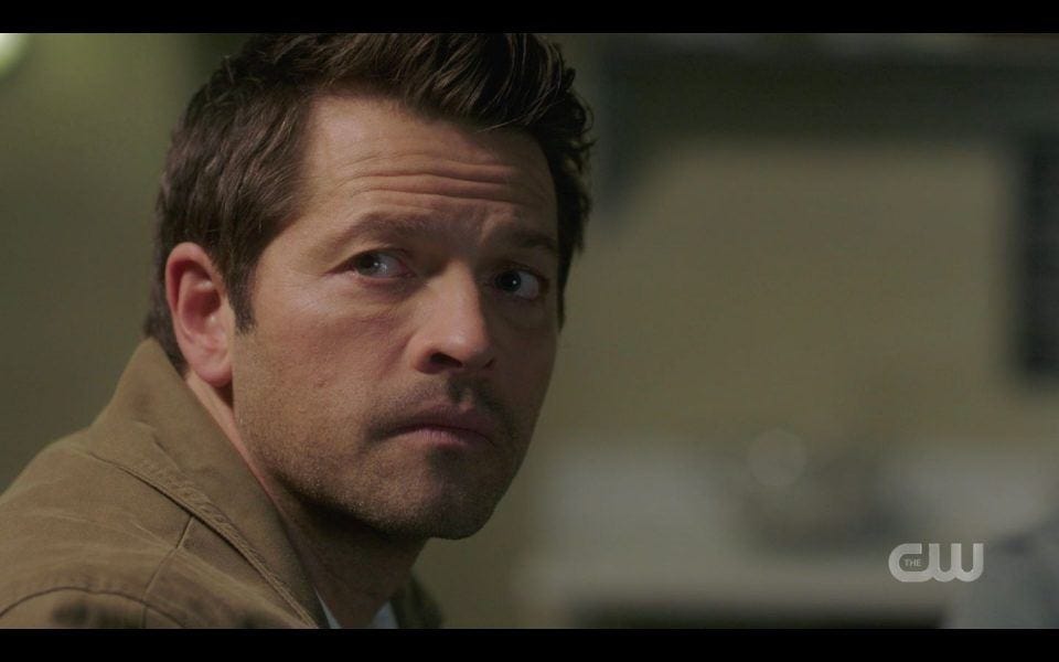 Castiel looks as Sam joins he and Dean Supernatural 1509