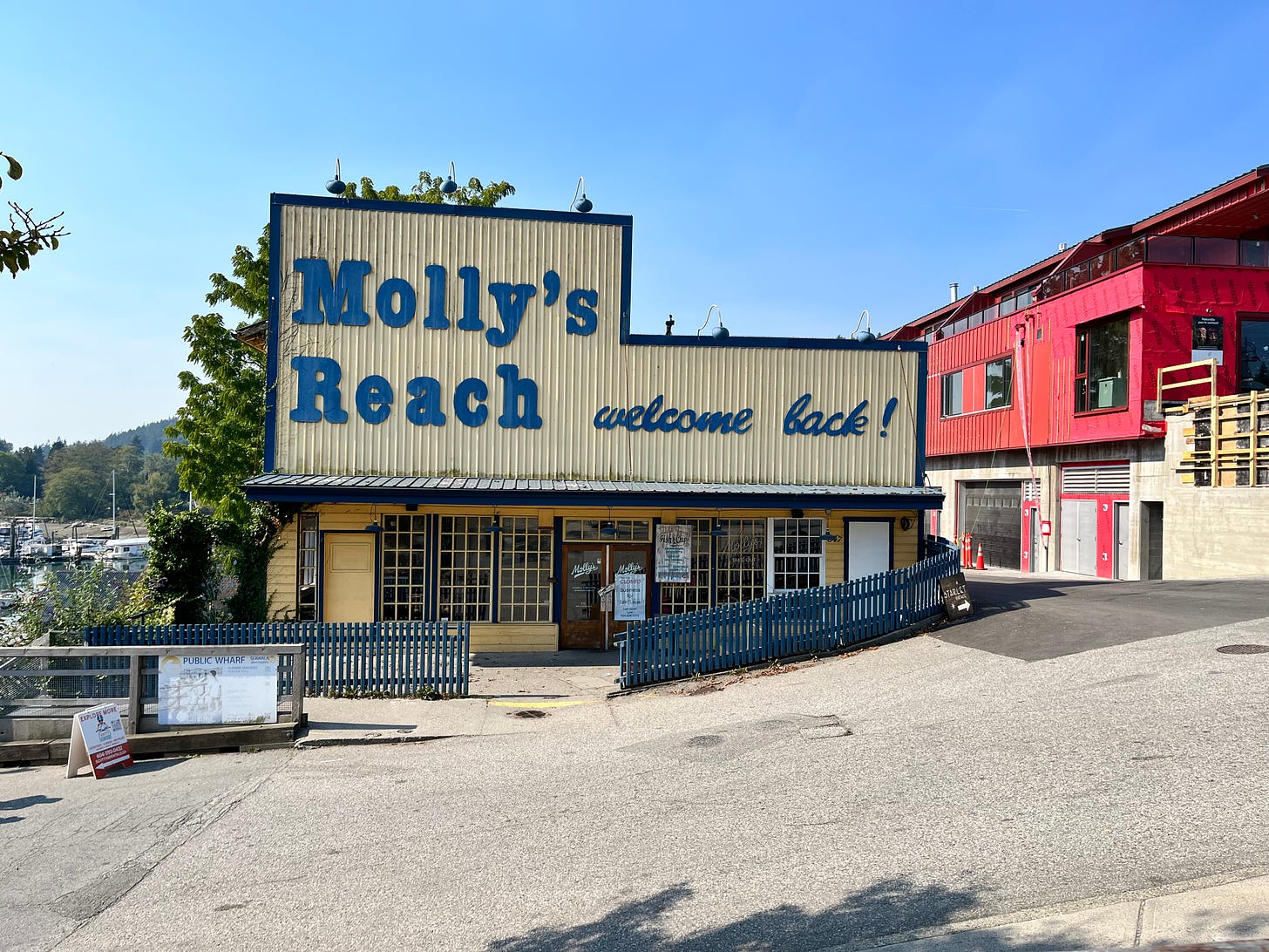 A photo of an old yellow cafe called Molly's Reach