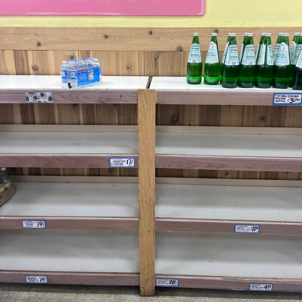 Empty shelves, except for some NZ water