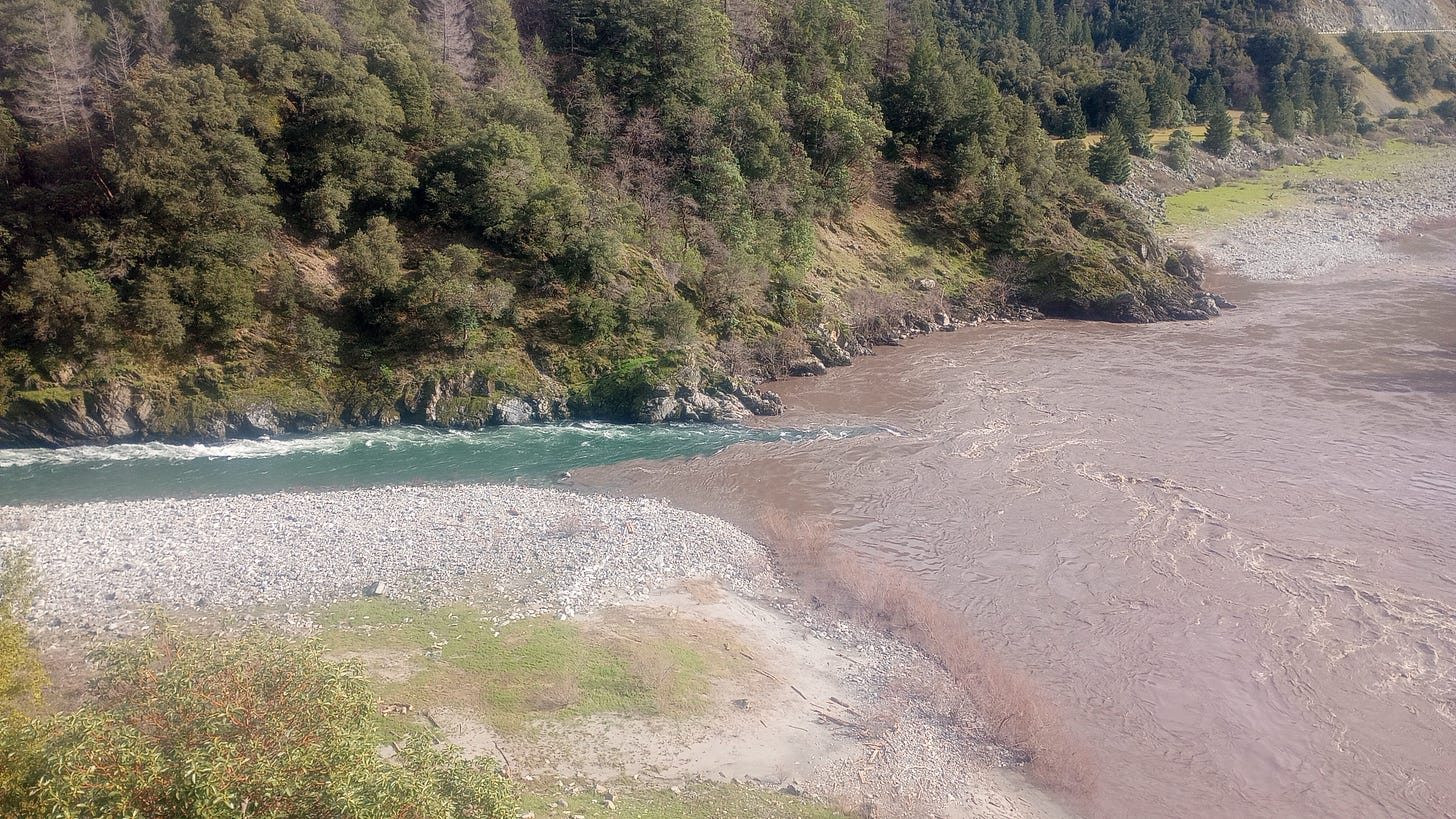 Salmon River on left, flowing into the Klamath, right, whose flow is from bottom to top in this photo.