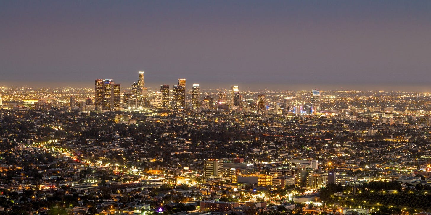 city skyline at night all lit up