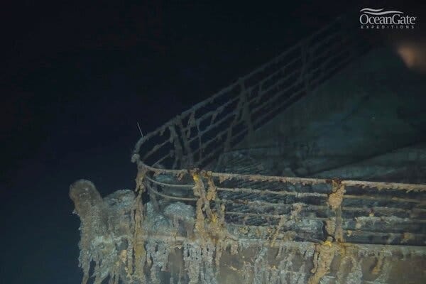 A murky underwater photo of the deck of the Titanic.