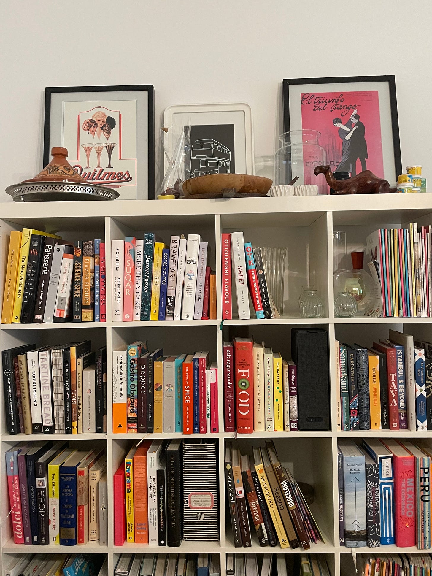 Bookshelves filled with cookbooks.