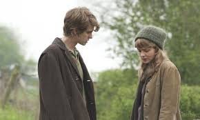 Tommy and Kathy talk outside on a walk