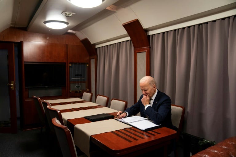 Darkened plane, silent overnight train: how Biden got to Kyiv