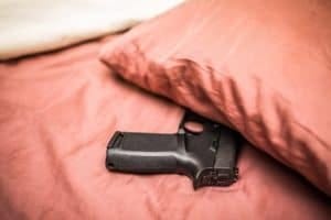 gun under pillow