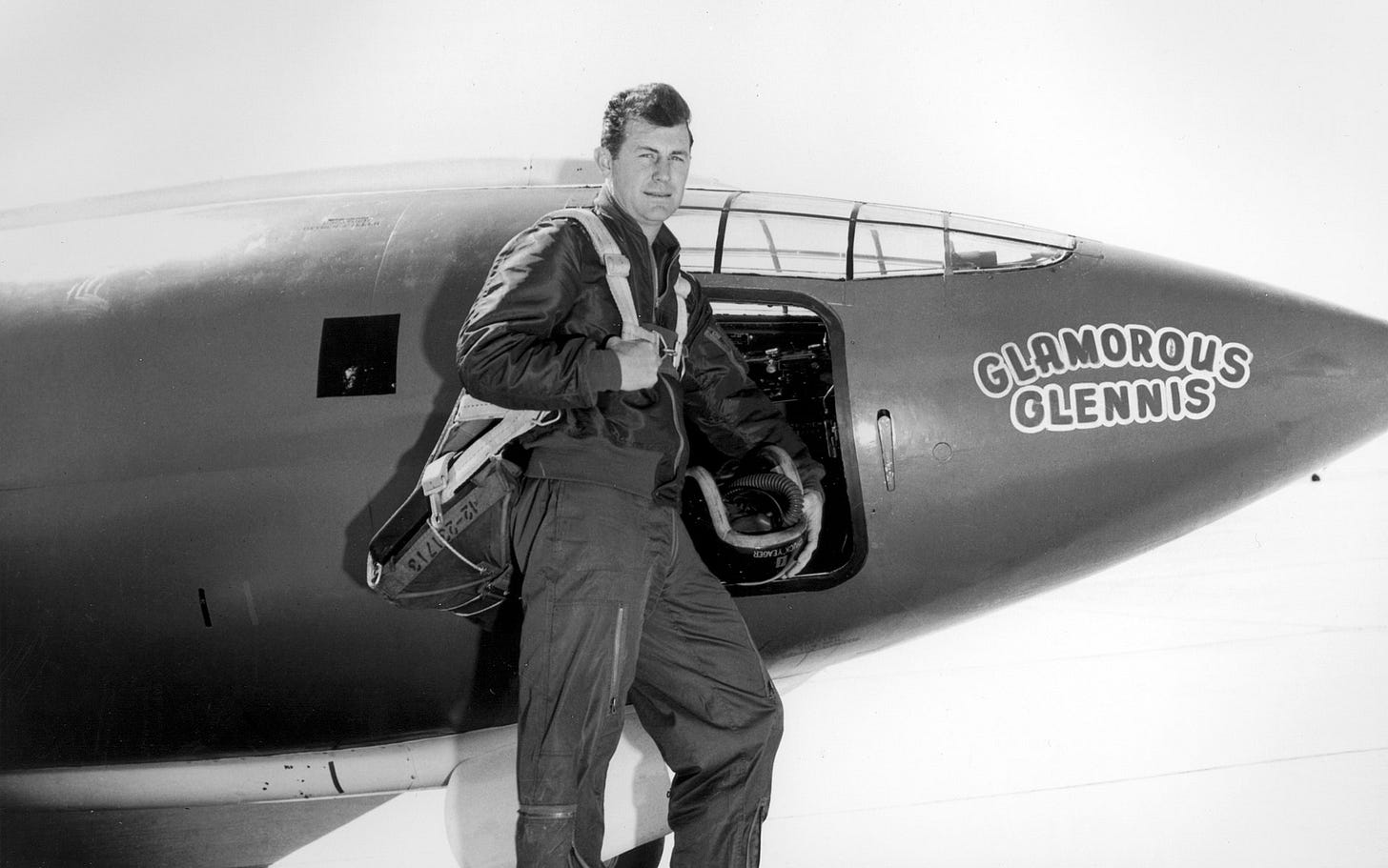 Yeager stands in front of the Bell X-1 named Glamorous Glennis. He named all of his assigned aircraft in some variation after his wife. Yeager stands in front of the Bell X-1 named Glamorous Glennis. He named all of his assigned aircraft in some variation after his wife.