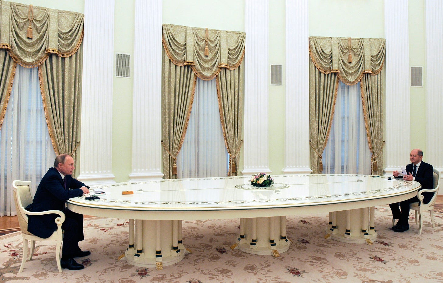 What Vladimir Putin's long table tells us about Russia's inner workings
