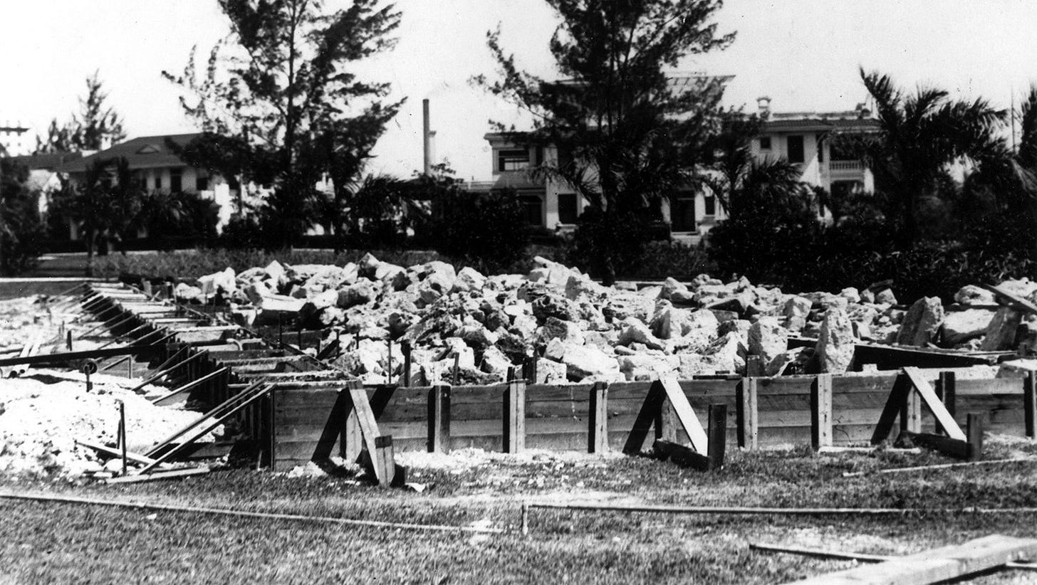 Figure 2: Fort Dallas Barracks being moved in April of 1925. Courtesy of Florida State Archives.