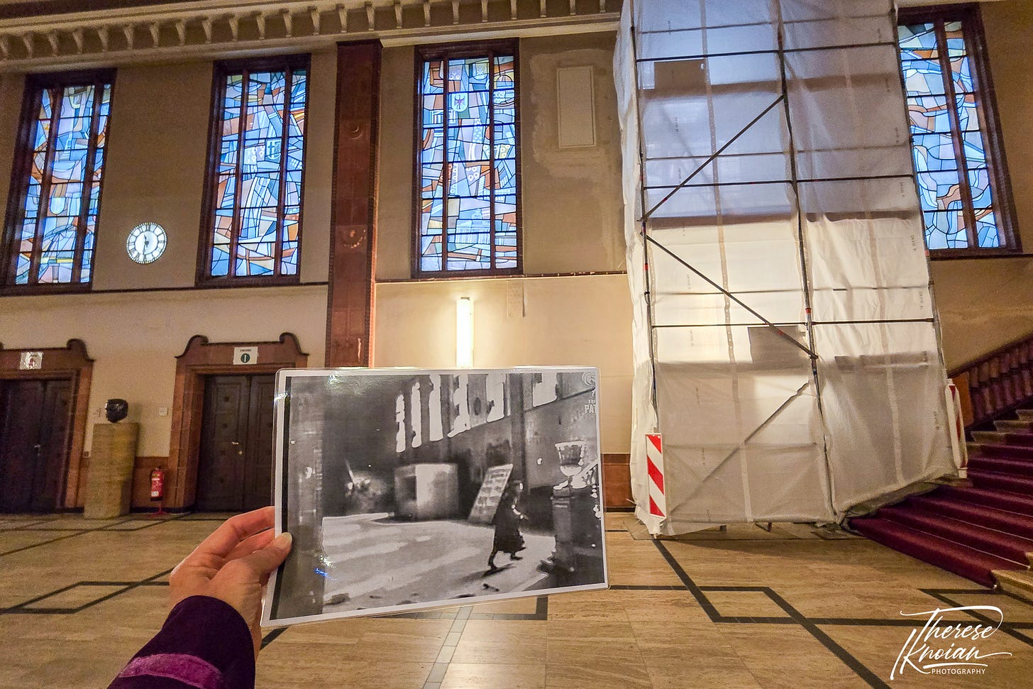 Looking at a photo from a Soviet newsreel taken inside the Schoeneberg city hall.