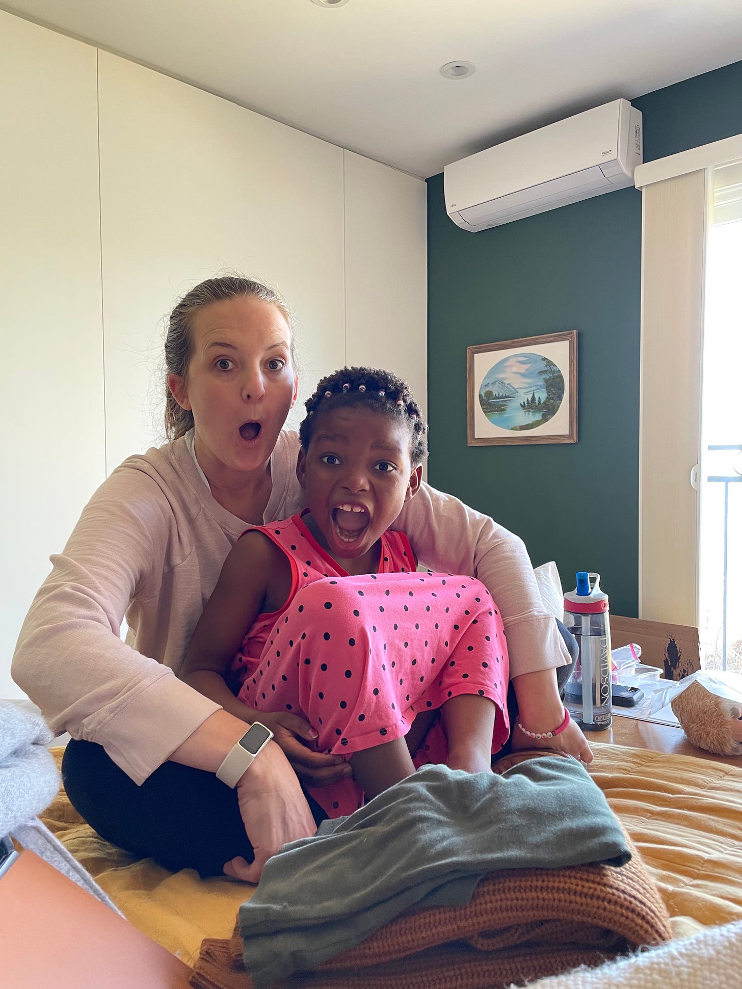 a white woman (carter) and a Black kid make surprised faces
