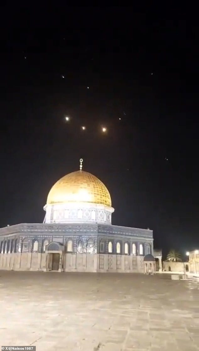 Lerner told reporters that the Israeli government will decided on what steps to take forward as early as Monday. Rocket trails in the sky above Al-Aqsa Mosque are seen here