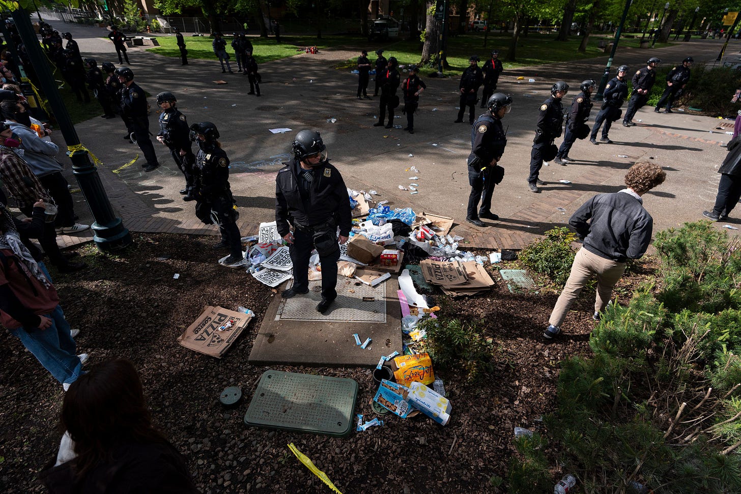 Police officers block off an area on the Portland State University campus in Portland, Oregon, on May 2. Police officers block off an area on the Portland State University campus in Portland, Oregon, on May 2.